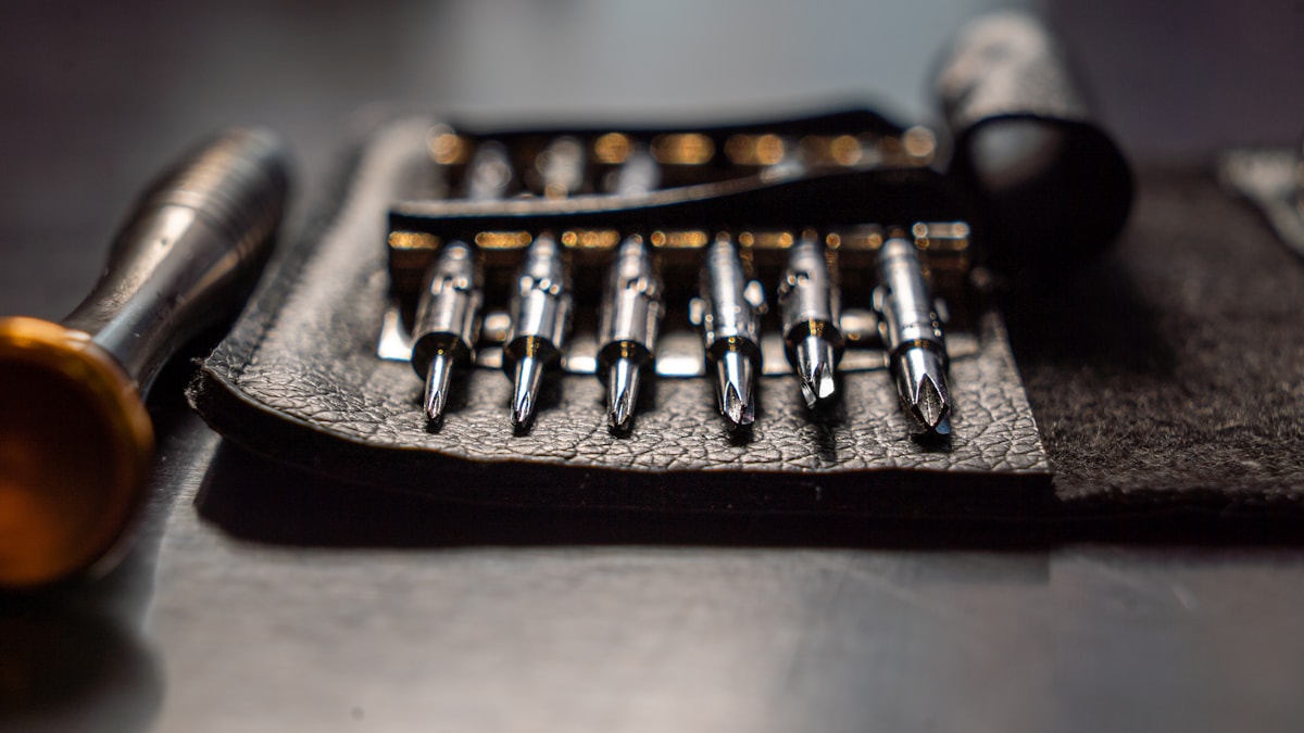 Hand tools arranged on a workbench
